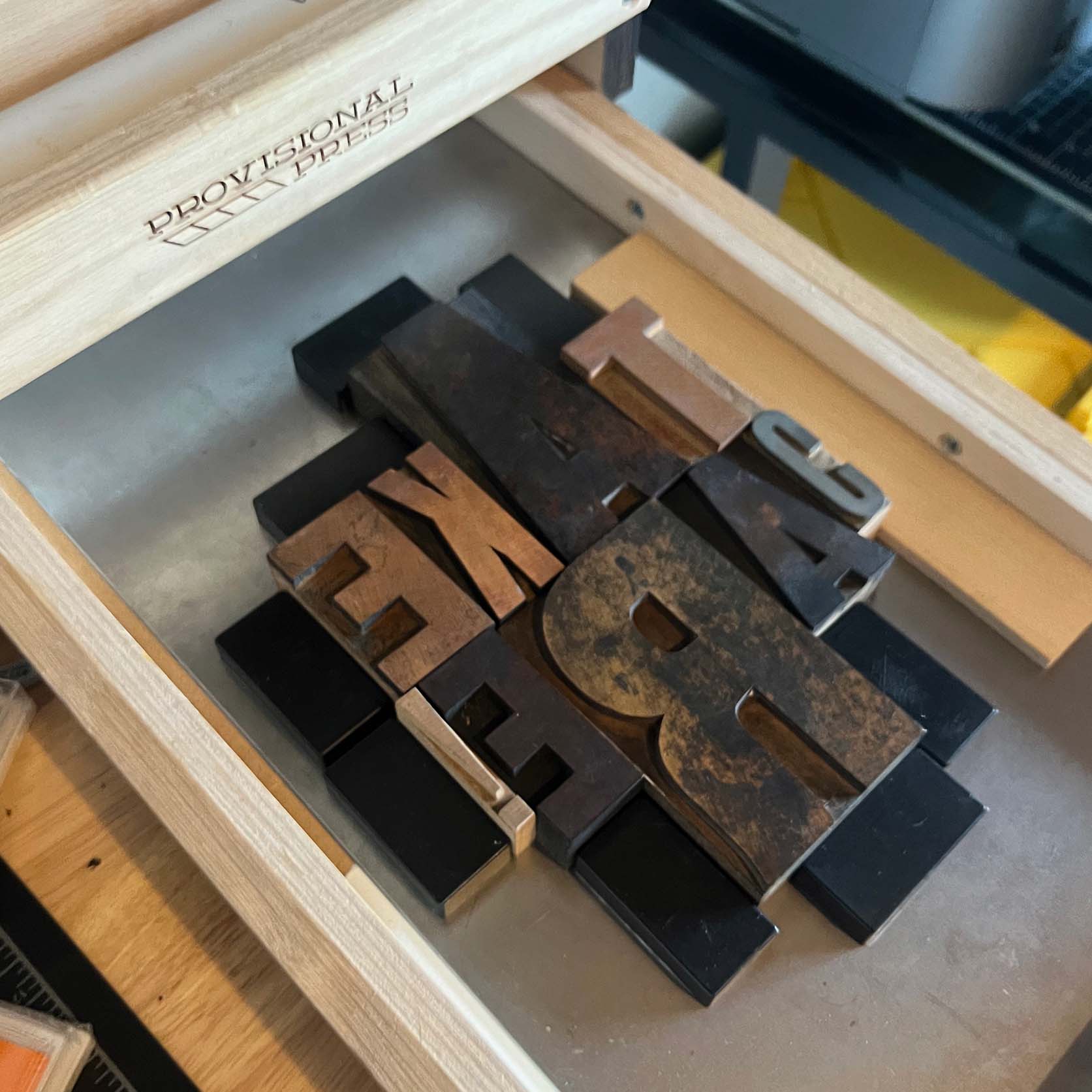 Letterpress letters in Spainhour Creative Work studio